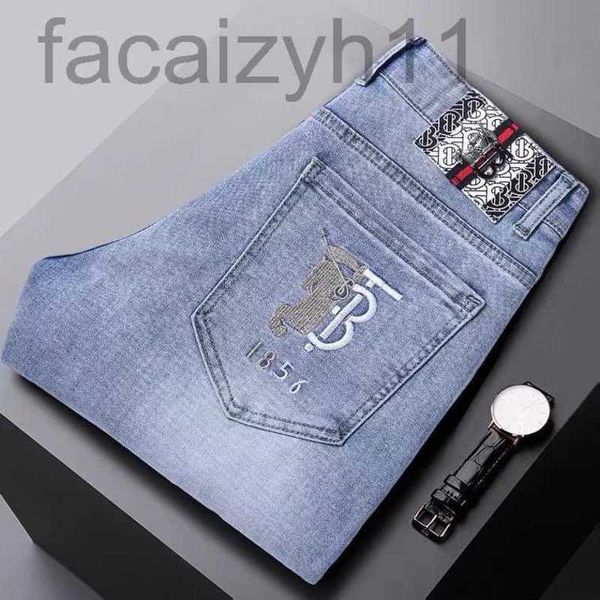 

men's jeans designer light embroidered jeans spring and summer slim fitting stretch pants with small feet 717g, Blue