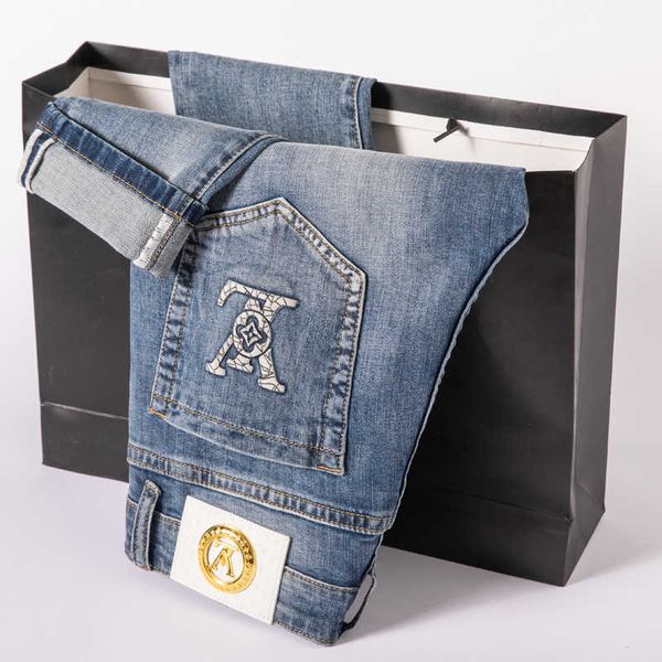 

mens jeans designer brand light blue jeans men's spring slim small straight embroidery stretch casual pants