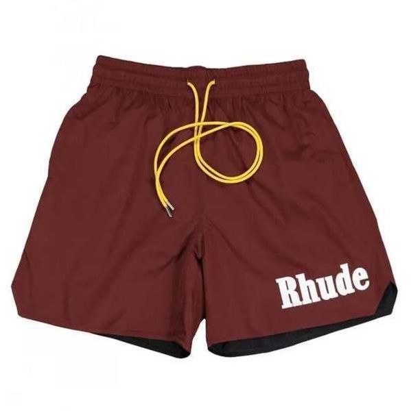 

2023 new fashion brand rhude men's and women's shorts version mclaren summer high street drawstring fog capris loose american ym, White;black