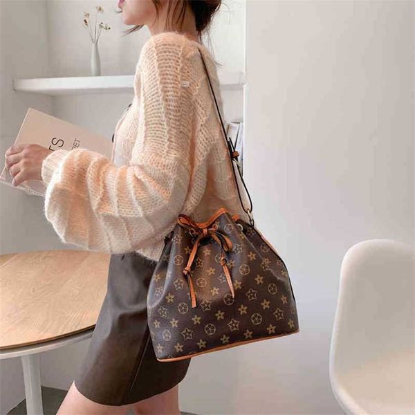 

women's luxury designer new summer handbag women's and old flower shoulder bucket personalized tide brand drawstring messenger bag
