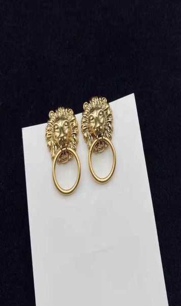 

luxury designer fashion charm earrings lion head ladies earring1613886, Golden