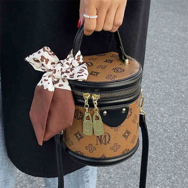 

women's luxury designer new summer handbag popular small female minority shoulder messenger and style portable bucket bagdjse