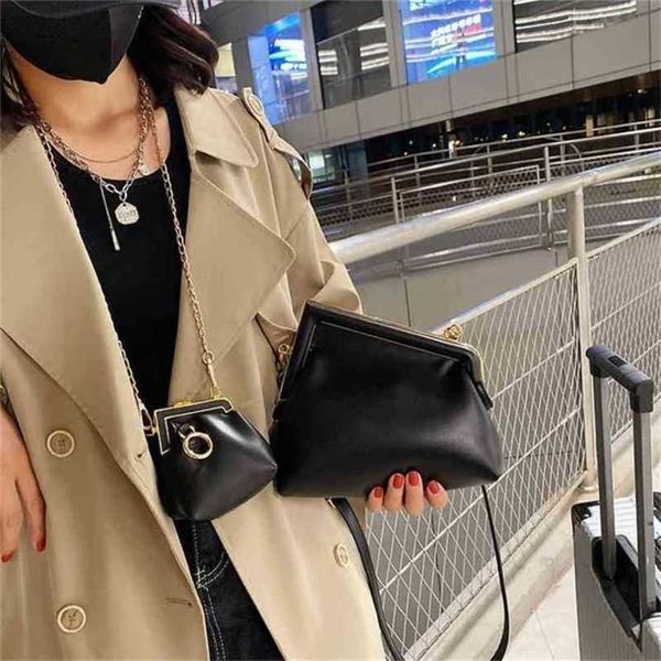

luxury designer new women's handbag female solid color messenger high-end buckle