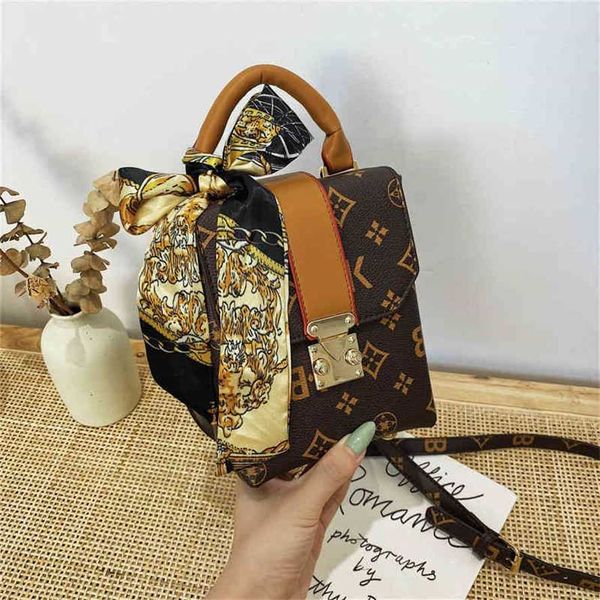 

handbag 2023 new bag minority old flower box female summer and portable style shoulder messenger