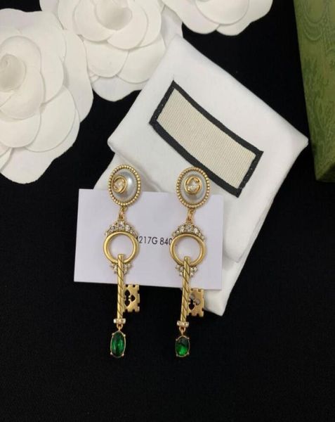 

2021 chic double letter charm earrings with gift box embossed stamp studs eardrop dangler for women party anniversary7437438, Golden