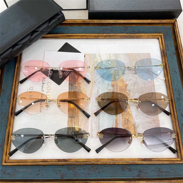 

designer men's and women's beach couple sunglasses 20% off fashionable cat-eye the same frameless cut edge, White;black