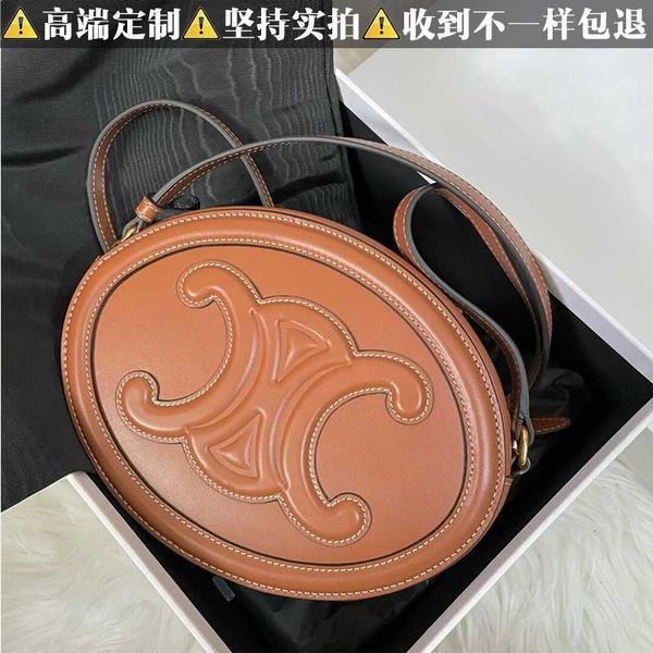 

arc de triomphe round cake bag pig nose 2023 new leather one shoulder messenger bag women's high-grade sense niche and versatile