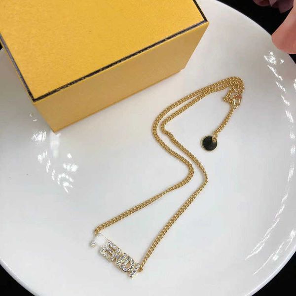 

2023 designer 22 year new fenjia twist letter rhinestone necklace brass material fashion versatile sweater chain, Black