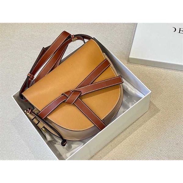 

luo family colored drawstring half round crossbody women's bag