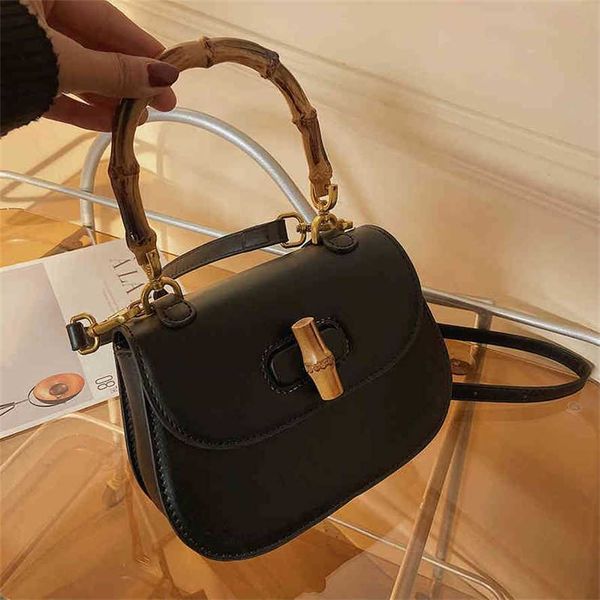 

2023 designer bag bamboo new hand simple atmosphere fashion small personality trend female minority bag