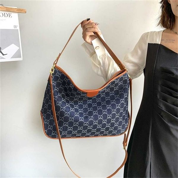 

2023 designer bag 2023 summer new fashion simple large capacity tote bag denim cross shoulder commuting bag women