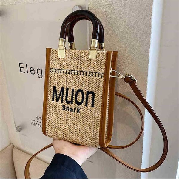 

2023 designer bag straw female 2023 new fashion summer minority design portable woven net red texture messenger bag
