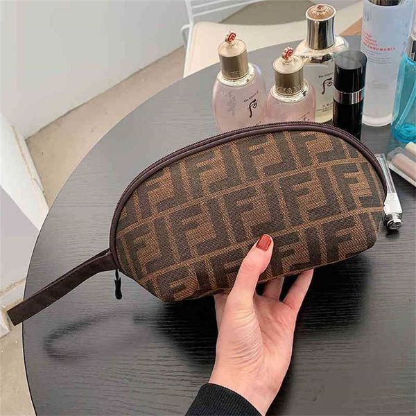 

2023 design wallet travel toiletries women's business trip portable storage large capacity hand holding simple mobile phone bag