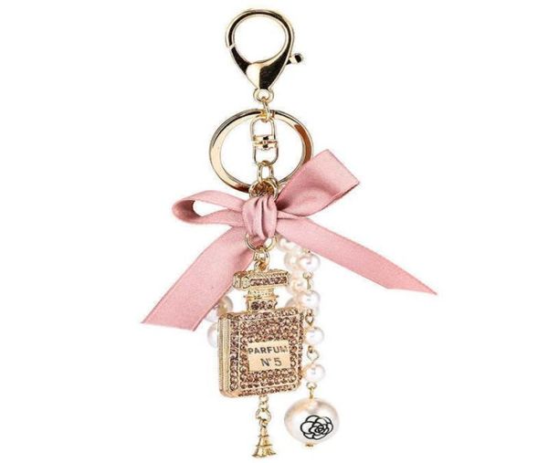 

fashion imitation pearl perfume bottle keychain car key ring women bag charm accessories cute bow key chain creative keyrings g1015657189, Silver