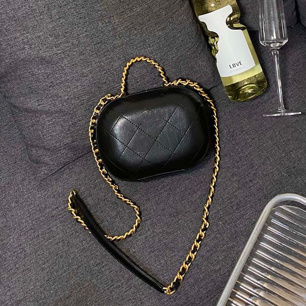 

italy womens black makeup egg tote bags calfskin gold metal braided handle suitcase diamond quilted hardware chain crossbody shoulder design