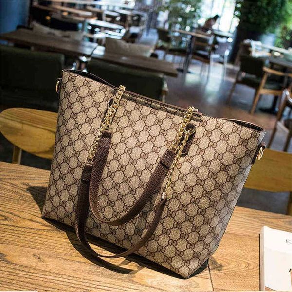 

2023 designer bag bag women 2023 new one shoulder portable diagonal straddle tote women's bag versatile temperament large capacity