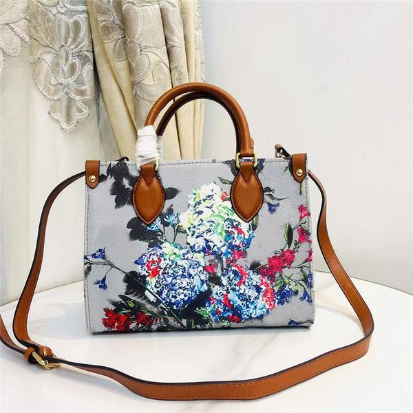 

designer tote bag empreinte golden flowery floral garden collection double totes leather shoulder handbags with adjustable straps cross body