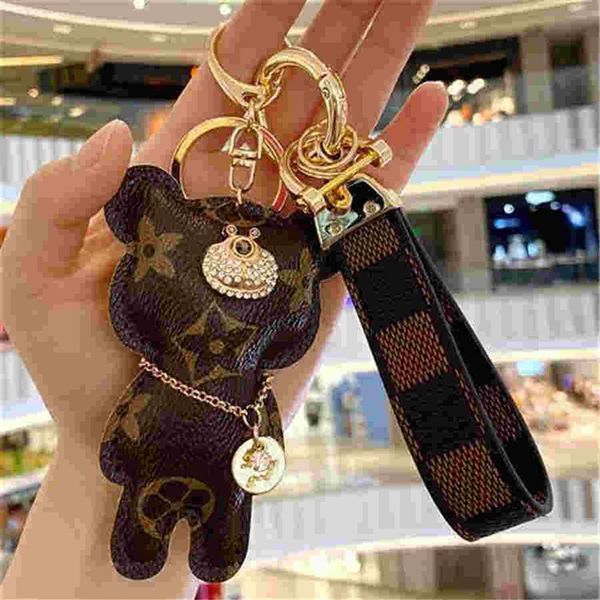 

ll2020 fashion brand dog keychain classic chic keyring women men luxury car pendant designer key chain trinket jewelry 293d, Silver