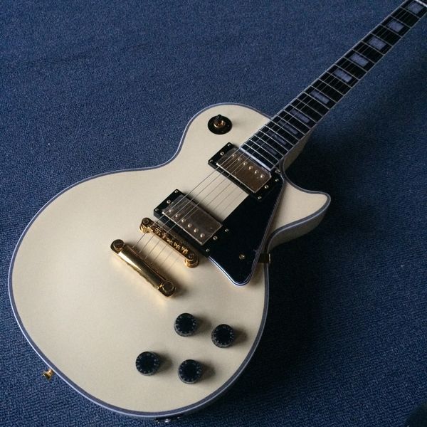 

creamy yellow 6-string electric guitar,rosewood fingerboard, gold hardware delivery