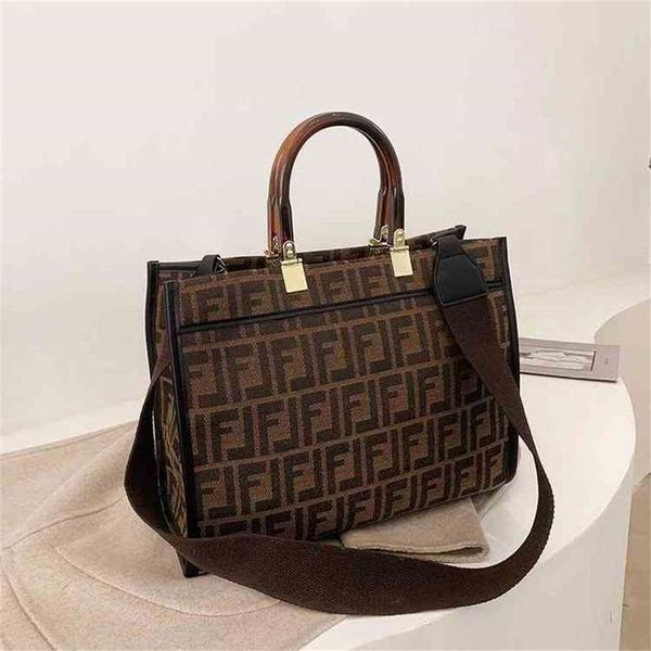 

2023 designer bag handbag hand-held crossbar trend tote canvas shopping