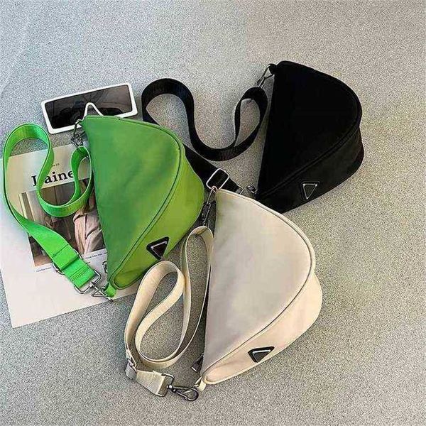 

2023 designer bag korean women's new triangle messenger personalized fashion niche design ins shoulder leisure chest bag