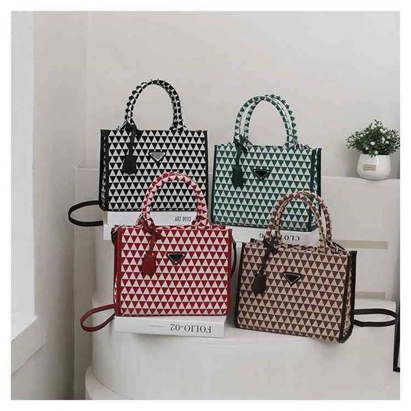 

2023 designer bag 2023 new family embroidered tote bag canvas triangle tote zither score bag hand-held single shoulder messenger bag
