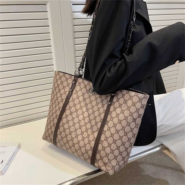 

designer bag 2023 new women's duoqintuote european and american style simple color contrast printing hand one shoulder bag large capaci