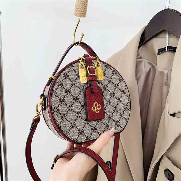 

2023 designer bag korean niche shoulder 2023 new color matching small round fashion women's hand messenger bag
