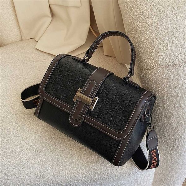 

2023 designer bag handbag small female style stone pattern letter messenger texture one handbag