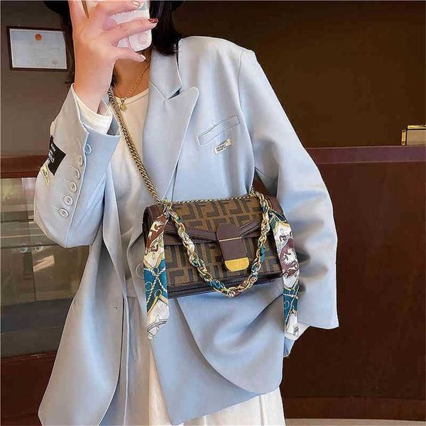 

2023 designer bag handbag french minority texture simple one shoulder red chain