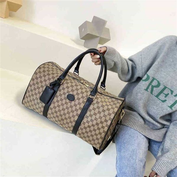 

2023 designer bag hand travel large capacity business short distance boarding luggage one shoulder slanting bag