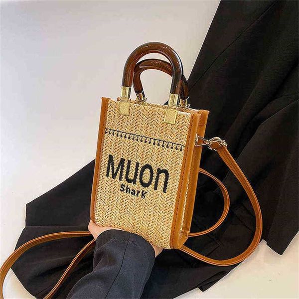 

2023 designer bag straw female 2023 new fashion summer niche design portable woven net red messenger small bag vmpp