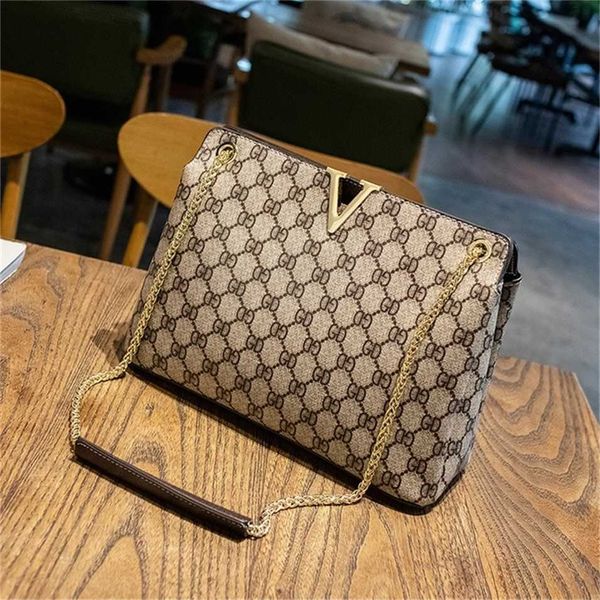 

2023 designer bag handbag women's korean high-capacity tote printed single messenger portable chain