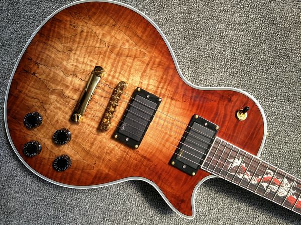 

custom electric guitar with a long history rotten maple wood gold hardware mahogany wood