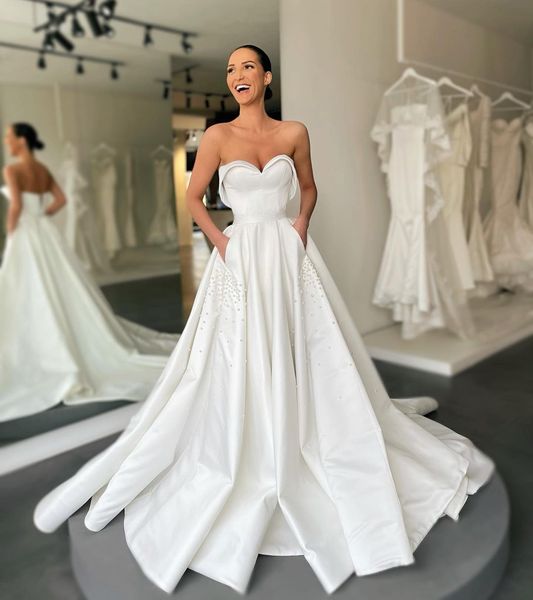 

sweetheart a line wedding dresses for bride pearls detail satin wedding dress vestidos de novia sweep train corset back designer bridal gown, White