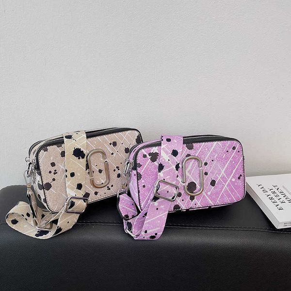 

spotted graffiti bag 2023 new simple women's bag cross shoulder small square bag women's camera bag
