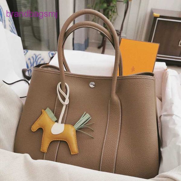

original designer handbags hermm 2023 new layer cowhide garden bag versatile one shoulder oblique span tote portable big shopping bucket