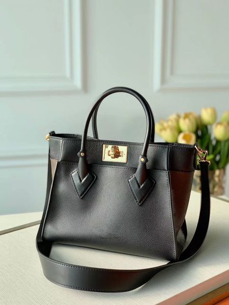 

2023 new handbag women luxurys designers bags casual travel ribbon tote dermis bag material fashion totes