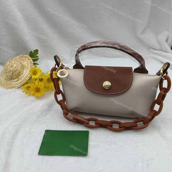 

High quality small wallet Handle Color 2023 Single Quality the Lady Cognac Mini summer Beach bag Leather Laptop Bags Dumplings Package luxury handbag, Yellow chain