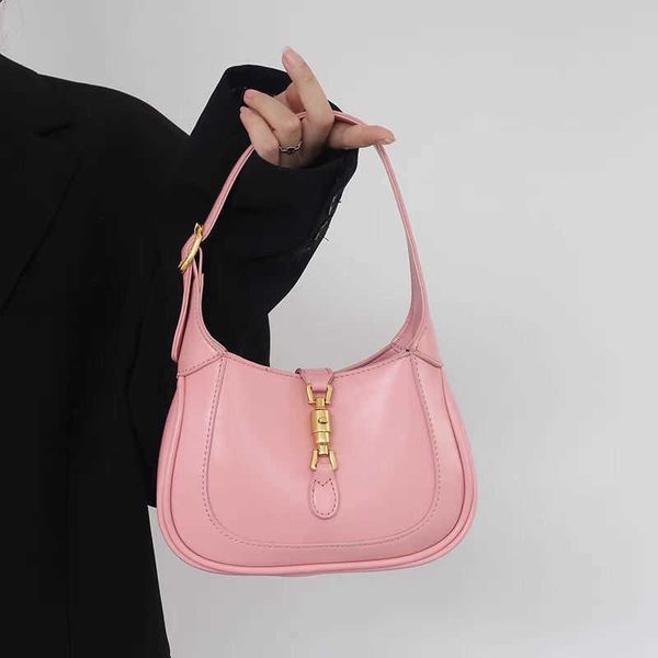 

1961 vintage horse buckle mini french underarm bag for women in spring and summer new texture small portable messenger bag