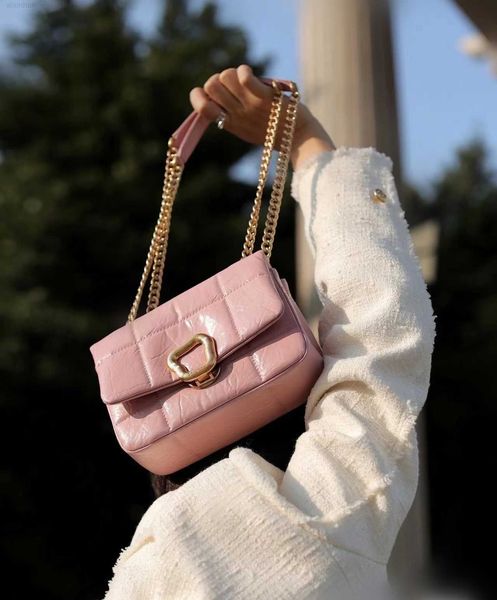 

songmont chocolate series pink wonton lock buckle cowhide handheld crossbody chain bag