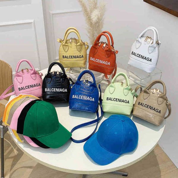 

urban bag female 2023 new candy color stone letter portable one shoulder messenger style bright face shell bag