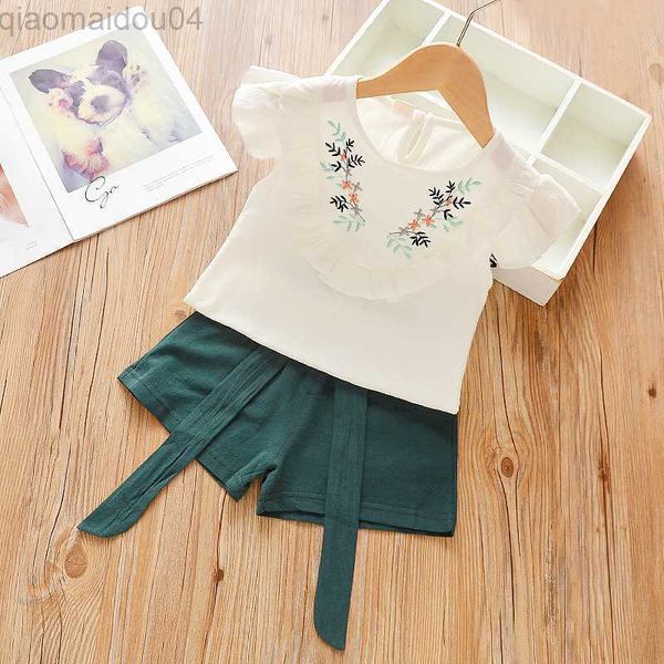 

clothing sets 2023 summer clothes new girl flying sleeve flower short sleeve shirt cute doll shirt kid outf aa230504, White