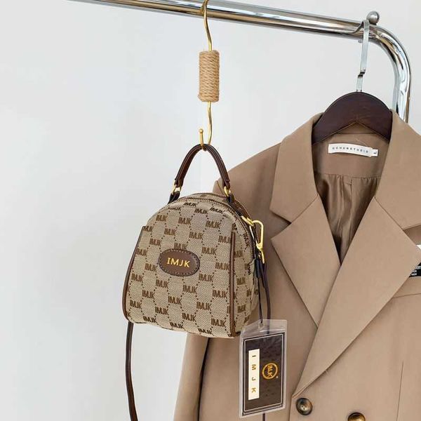 

2023 new canvas women's bag trend mobile phone bag mini bucket bag tibet special chain