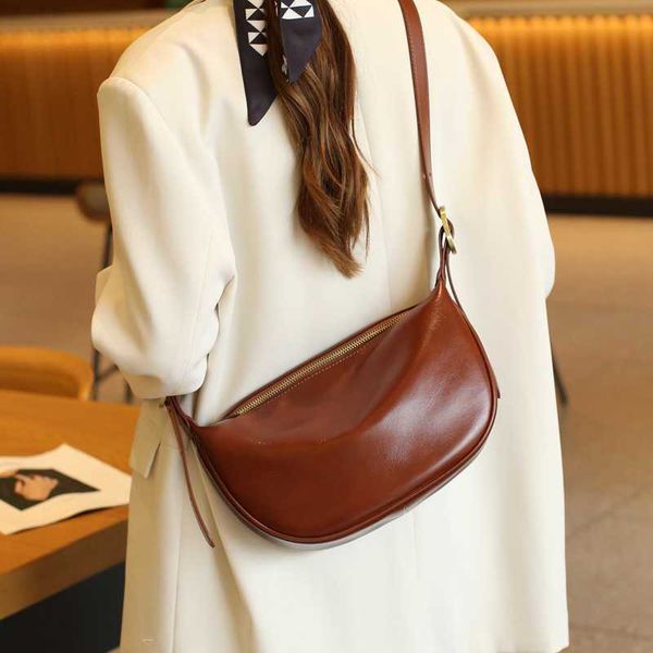 

2023 niche new commuting versatile cowhide dumpling girls vegetable tanned genuine leather for women single shoulder crossbody underarm bag