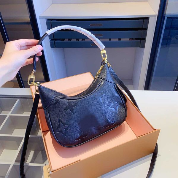

2023 designer new summer ladies' armpit bag european and american style crescent shaped shoulder bag original cowhide material with two