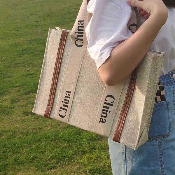 

handbags outlet 2023 new summer sling single shoulder canvas small design portable tote bag women's large capacity