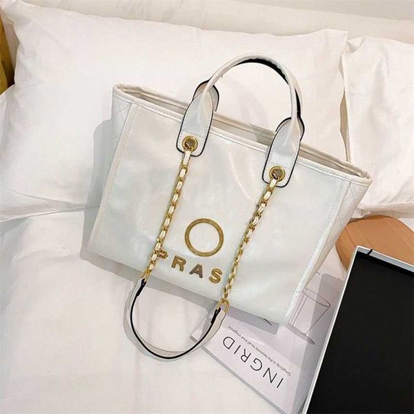 

classic brand handbags beach bags luxury metal badge tote bag small evening handbag female capacity large leather one shoulder backpack ap20