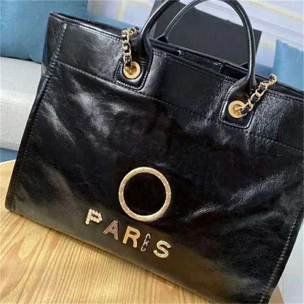 

luxury classic handbags beach bags brand metal badge tote bag small evening handbag female capacity large leather one shoulder backpack whol