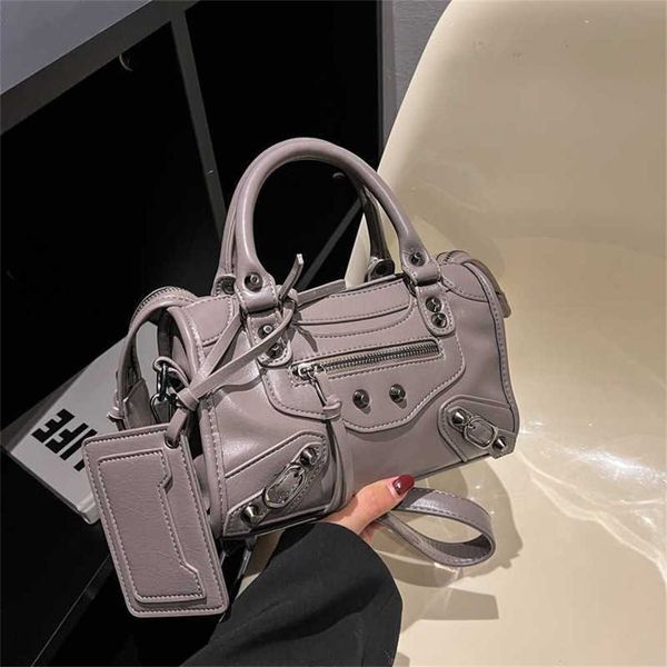 

purses french handheld bag women's winter new versatile commuter one shoulder crossbody bag high capacity riveted locomotive bag